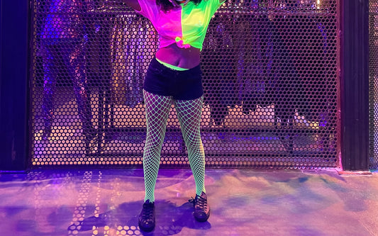 Photograph of yellow fishnets under uv lighting